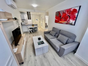 Comfort Apartment | Living area | 45-cm Smart TV with satellite channels - apartamentos Rincón del mar  (Velez-Malaga)