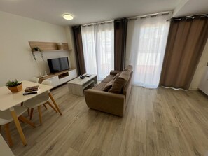Deluxe-Penthouse, 2 Schlafzimmer, Stadtblick | Wohnbereich