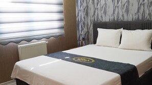 1 bedroom, premium bedding, desk, laptop workspace