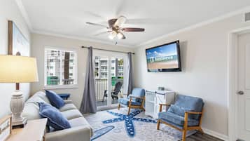 Signature Condo, 2 Bedrooms, Beach View, Beachside | Living room | 40-inch Smart TV with cable channels