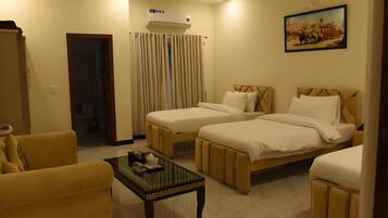 Deluxe Triple Room, City View | In-room safe, iron/ironing board, free WiFi, bed sheets