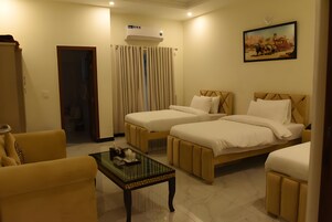 Deluxe Triple Room, City View | In-room safe, iron/ironing board, free WiFi, bed sheets