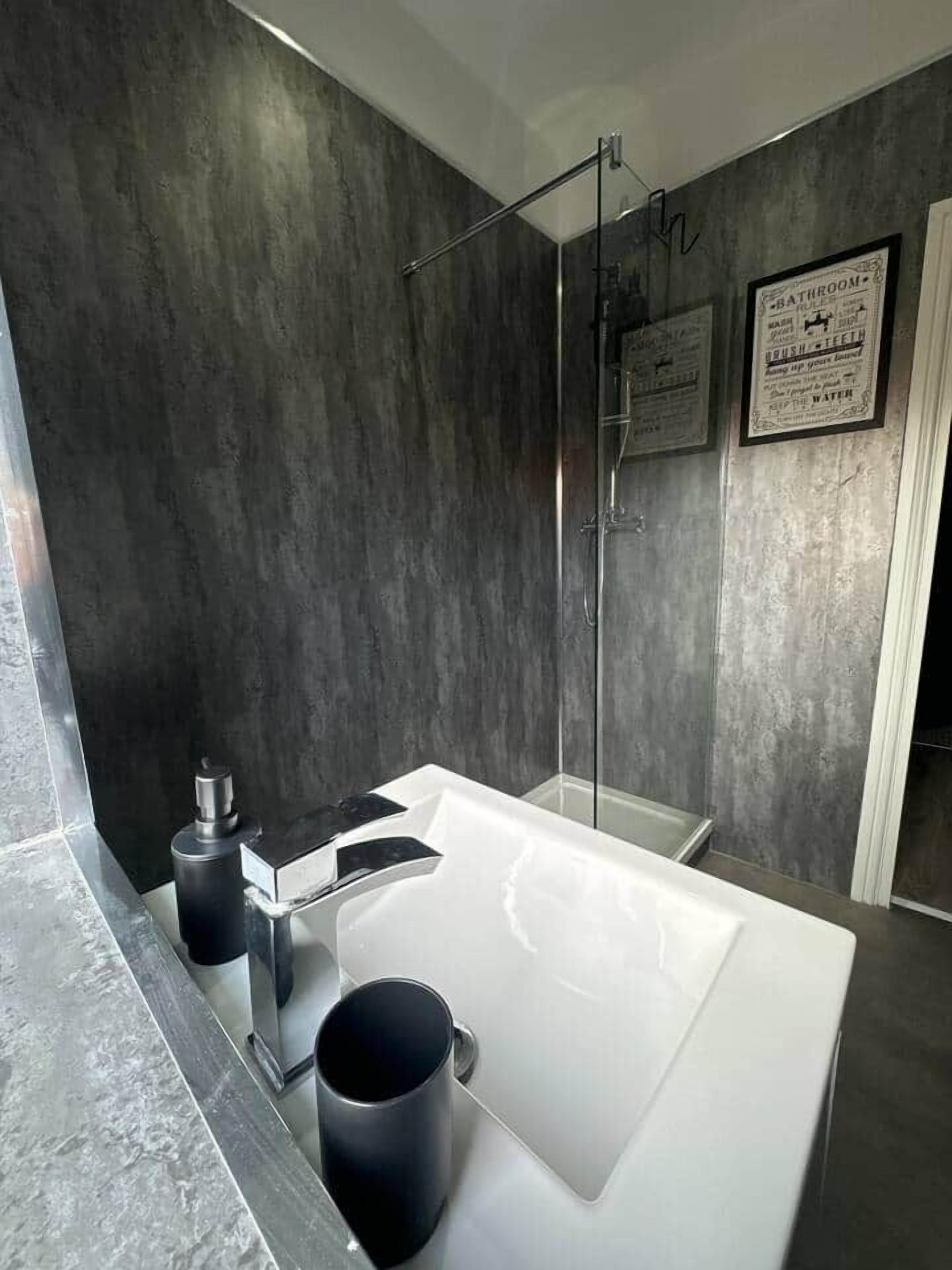 Shower, hair dryer, soap, shampoo