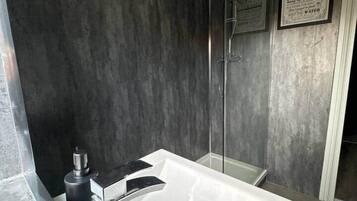 Shower, hair dryer, soap, shampoo