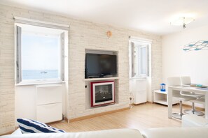 Comfort Apartment, 1 Bedroom, Sea View, Oceanfront | Living area | Flat-screen TV - Punta Apartment Joe 2.8 (Piran)