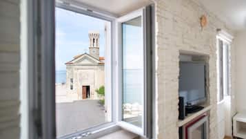 Comfort Apartment, 1 Bedroom, Sea View, Oceanfront | Living area | Flat-screen TV