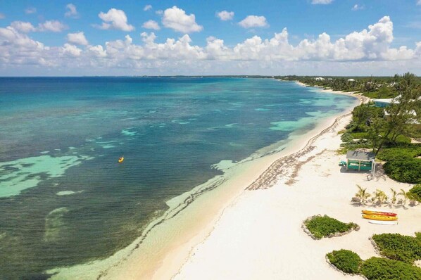 On the beach, sun loungers, beach towels