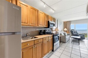 Fridge, microwave, oven, coffee/tea maker - Beacher's Oceanfront Balcony Plus with onsite Front Desk and Staff (St. Augustine)