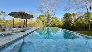 Outdoor pool, pool umbrellas, pool loungers