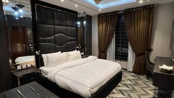 Deluxe Double Room, City View | In-room safe, desk, iron/ironing board, free WiFi