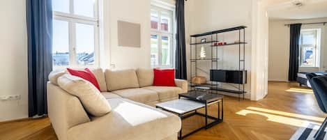 Deluxe Apartment, City View | Living area | Flat-screen TV