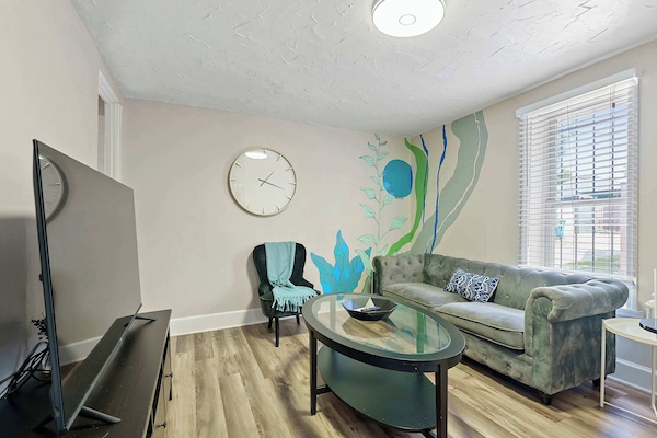 Curl up in the serene living room & stream your favorites on the smart TV