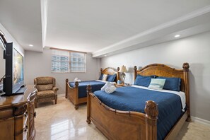 Bedroom with 2 queen beds and TV
