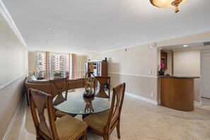 Dine in comfort at the table, which seats four