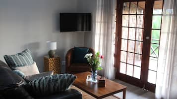 Deluxe-Ferienhaus, Seeblick | Wohnbereich | Drucker
