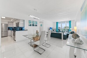 Dining table with seating for 4 - Ocean Wind – Luxury Beachfront Condo, Pool & Gym (Hollywood)