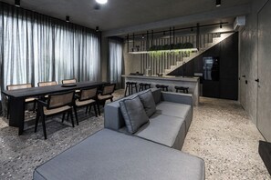 Deluxe Villa, Balcony | Living area | 65-inch Smart TV with cable channels, Netflix, streaming services