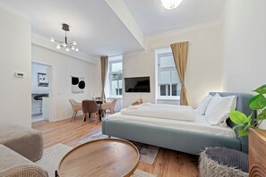 Standard Apartment | Living area | Flat-screen TV