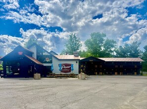 A building with a large sign for 'Pour Taproom' and a smaller sign for 'Lincoln.'