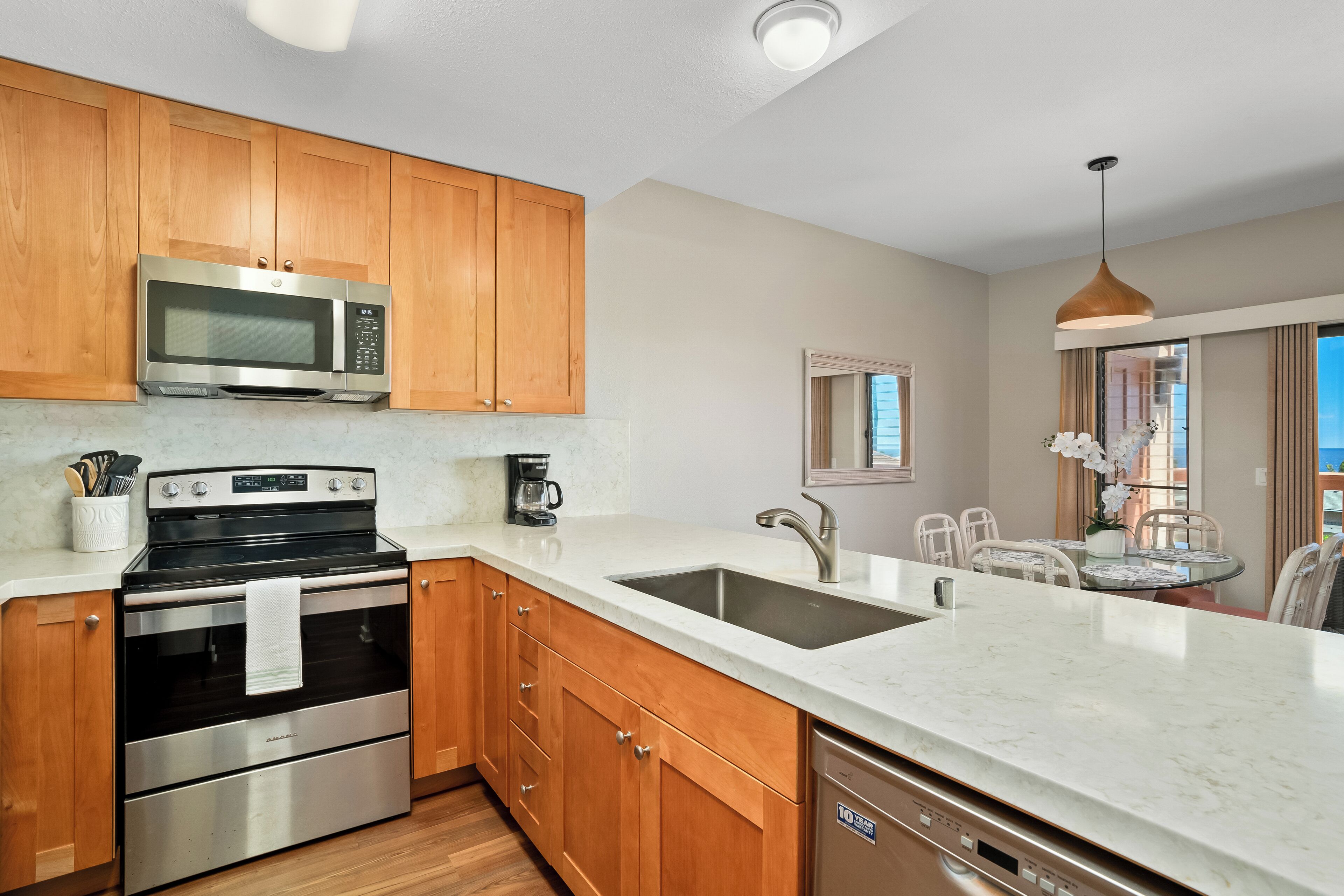 New! Bright, Airy 2BR Split-Level Condo w/Spacious Layout & Stunning Ocean Views - Photo 14