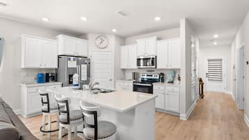 Pet Friendly Beach House - Osprey Landing | Private kitchen | Full-size fridge, microwave, oven, stovetop