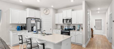 Pet Friendly Beach House - Osprey Landing | Private kitchen | Full-size fridge, microwave, oven, stovetop