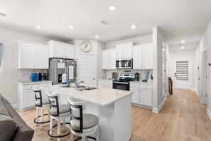 Pet Friendly Beach House - Osprey Landing | Private kitchen | Full-size fridge, microwave, oven, stovetop - Pet Friendly Beach House – Osprey Landing (Port St. Joe)