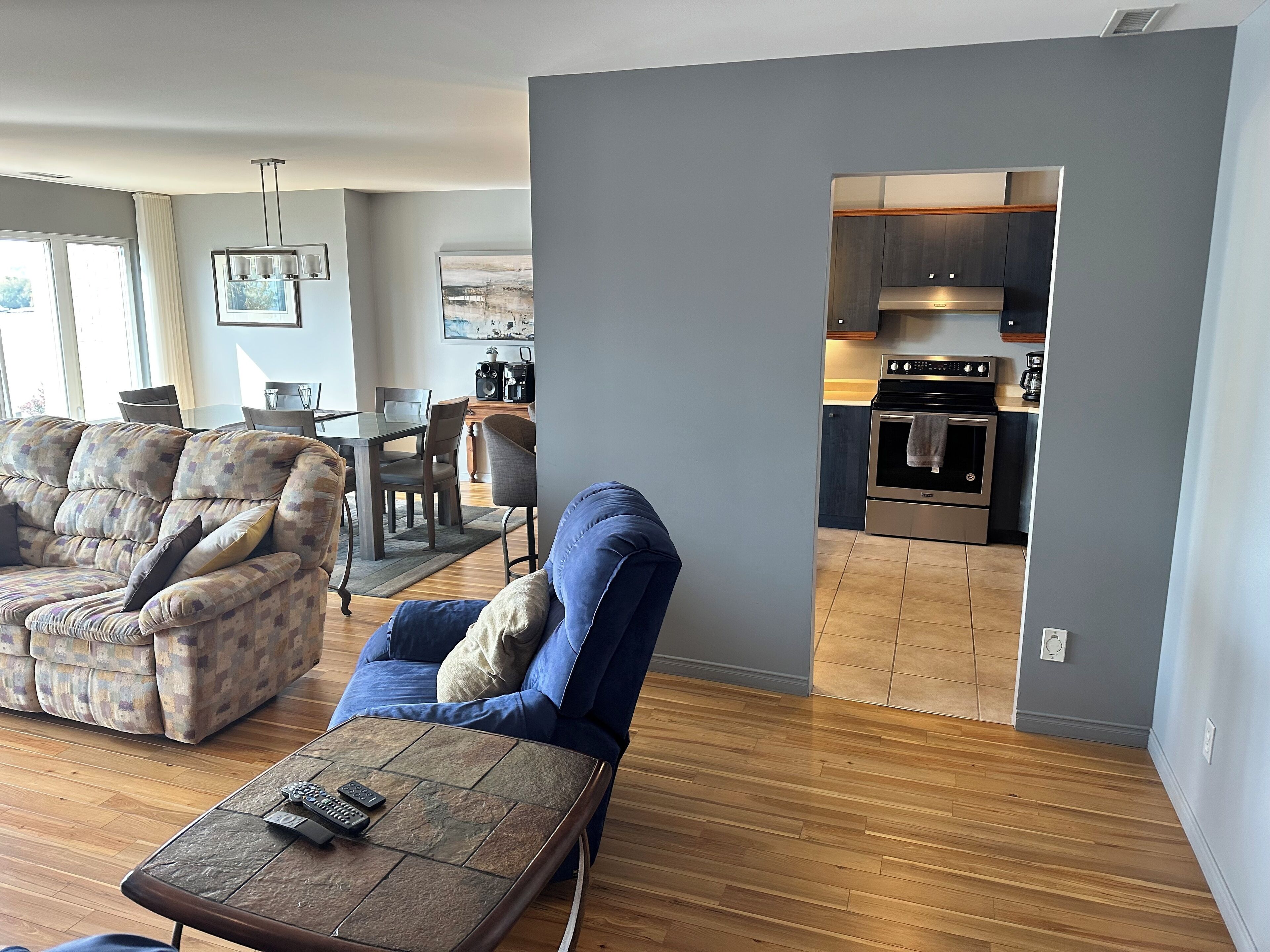 Condo, Balcony, Lake View | Living area | 54-inch TV with cable channels