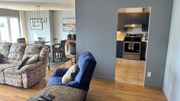 Condo, Balcony, Lake View | Living area | 54-inch TV with cable channels