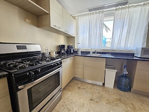 Fridge, microwave, oven, coffee/tea maker