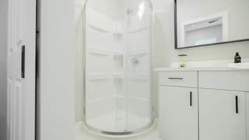 Shower, towels, toilet paper