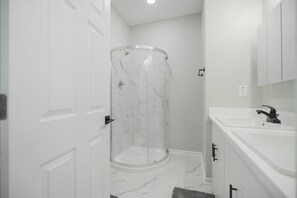 Shower, towels, toilet paper