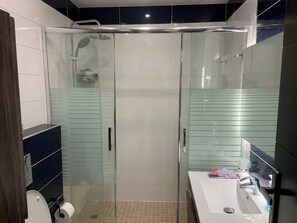 Shower, bidet, towels, soap