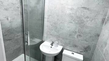 Shower, towels, soap, shampoo