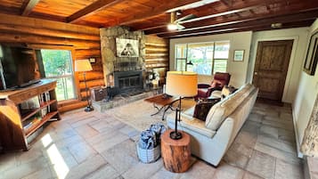 Smart TV, fireplace, DVD player, books