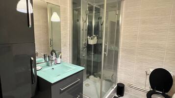 Shower, hair dryer, towels, soap