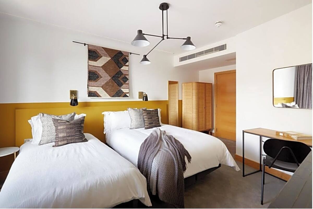 Family Triple Room, City View | In-room safe, laptop workspace, iron/ironing board (on request)