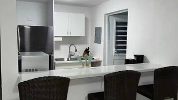 Fridge, stovetop, coffee/tea maker, toaster