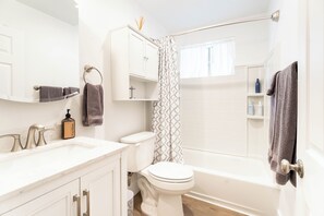 Hair dryer, towels, soap, toilet paper
