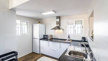 Fridge, microwave, dishwasher, coffee/tea maker
