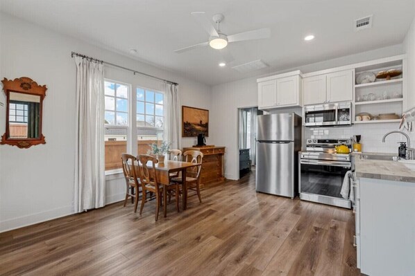 Coffee/tea maker, fridge, microwave, oven
