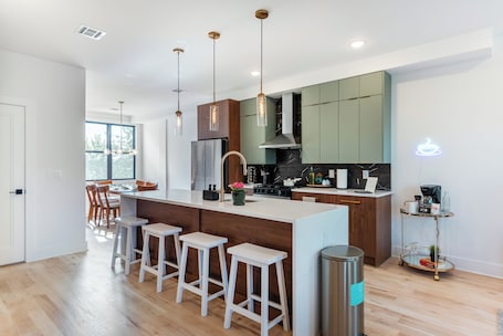 Cookware/dishes/utensils, spices. Luxe 4-bedroom house in charming Jersey City, next to Lightrail into NYC