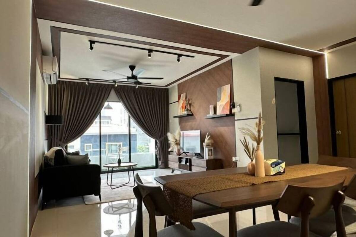 A modern living room with a dining area, a ceiling fan, and a large window with curtains.