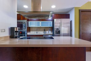 Fridge, microwave, stovetop, coffee/tea maker