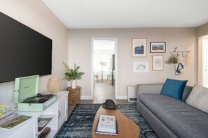 Apartment, 1 Bedroom | Living area | 55-inch Smart TV with digital channels