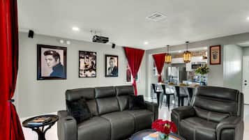 Smart TV, fireplace, books, stereo