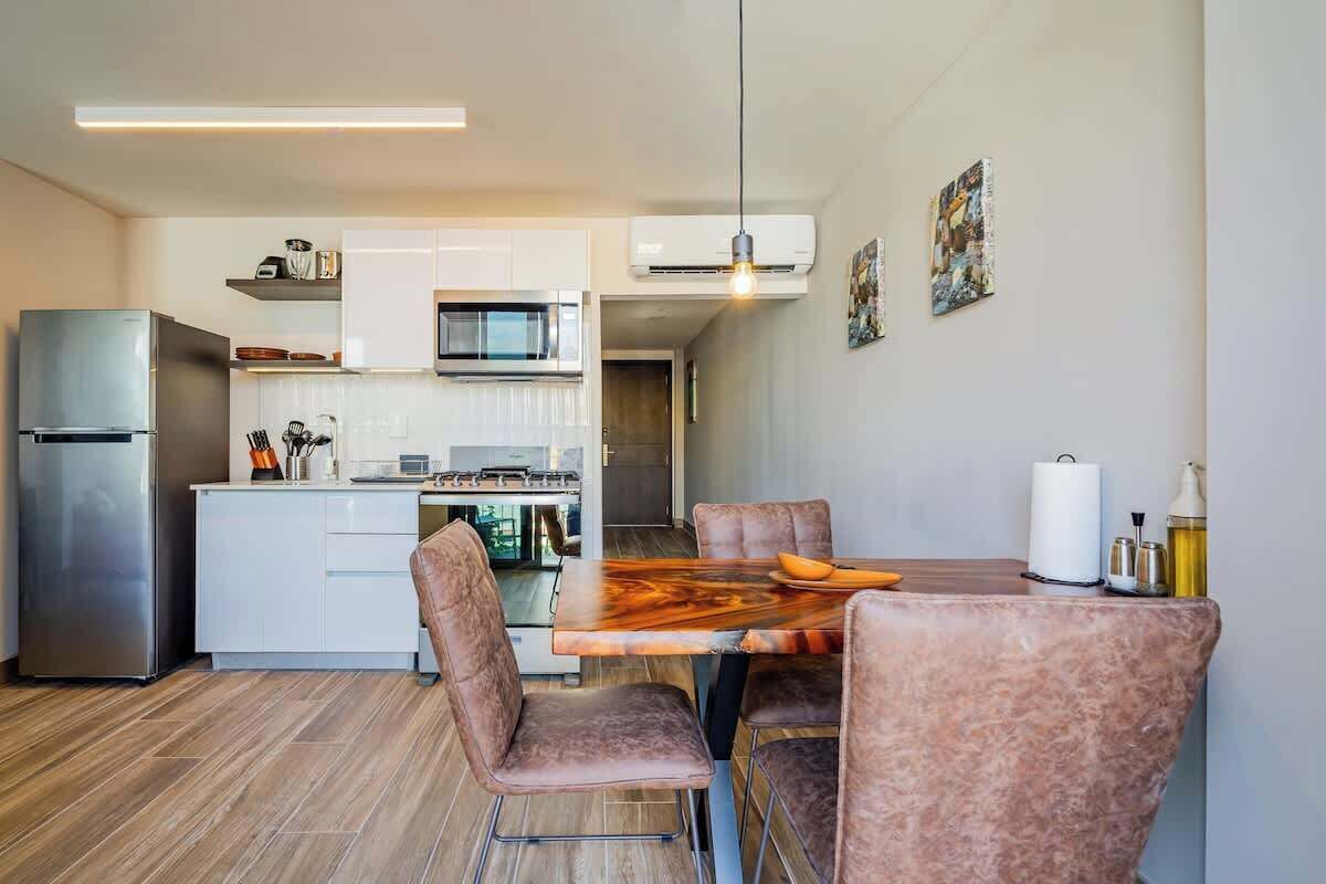 Coffee/tea maker, fridge, microwave, oven