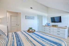 Bedroom 3 with King bed, desk, and private en-suite