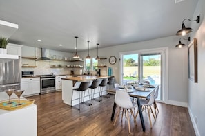 Sip morning coffee or grab a bite at the kitchen counter, offering seating for 4