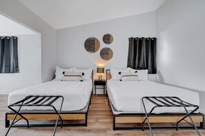 4 bedrooms, desk, iron/ironing board, travel cot